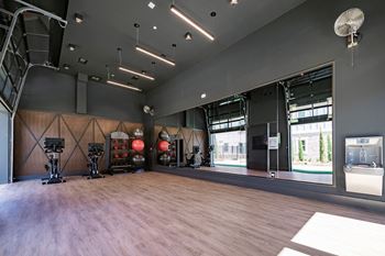 24-Hour cardio and strength training fitness center with yoga studio