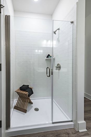 Garden soaking tub and standalone glass door showers*