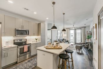Gourmet kitchen with prep island and bar seating