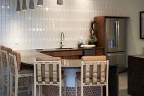 Richmond apartment for rent - A kitchen with a table and chairs.