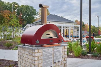 Outdoor grilling stations and pizza oven