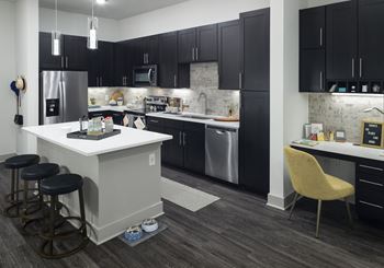 Quartz countertops in kitchen and baths