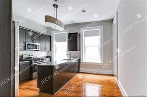 Richmond house for rent - an empty kitchen with a large island