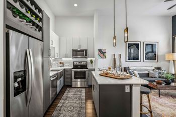Gourmet kitchen with prep island and bar seating