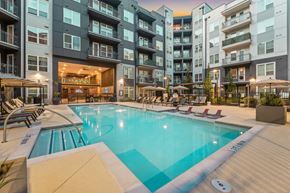 Atlanta apartment for rent - A large swimming pool in front of apartment buildings.