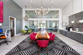 Cary apartment for rent - a dining room with a wooden table and chairs