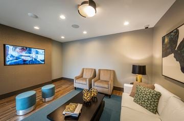 Grapevine apartment for rent - a living room with a couch and chairs and a tv