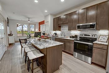 Espresso cabinetry with under cabinet lighting