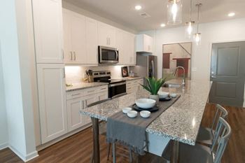 Designer kitchen with stainless steel appliances