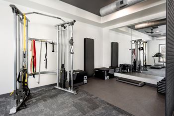 24-Hour cardio and strength training fitness center featuring peloton bike, hub training system, water rower, free weights and more!