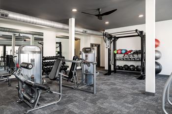 24-Hour cardio and strength training fitness center featuring peloton bike, hub training system, water rower, free weights and more!