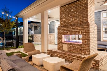Outdoor fireplace with comfy seating