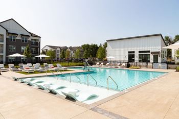 Resort-style pool with tanning ledge