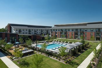 Resort-style pool with cabanas