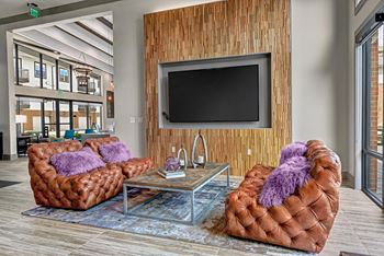 Resident lounge with billiards table and demonstration kitchen