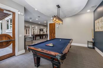 Game room with coffee bar, shuffleboard and billiards
