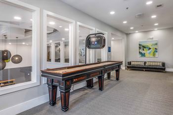 Game room with coffee bar, shuffleboard and billiards