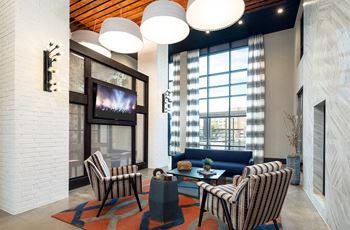 Resident lounge with tv and fireplace