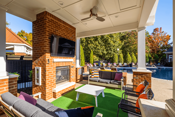 Summerhouse with fireplace, tv, and grills