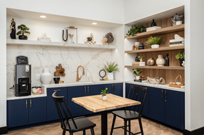 Charlotte townhouse for rent - A kitchen with a table and chairs in the middle.
