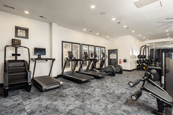 Brand new 24-hour cardio and strength training fitness center with peloton bikes and row machine