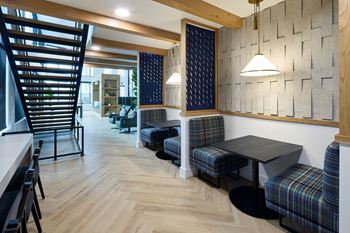 South building: clubroom with coffee bar, lounge seating with tv, ping pong table and foosball
