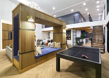 South building: clubroom with coffee bar, lounge seating with tv, ping pong table and foosball