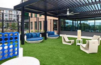South building courtyards with grilling and picnic areas, yard games, hammock park, lounge areas, and fire pit with cozy seating