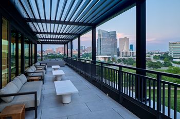 South building: sky lounge with remote work lounge, event kitchen, billiards table, and outdoor lounge with seating and fireplace