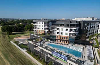 South building:  swimming pool with tanning shelf, overwater nets, and spectacular downtown views