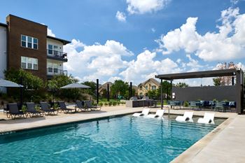 Resort-style pool and sundeck with wi-fi