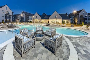Resort-style pool with tanning ledges