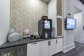 Cumming apartment for rent - a kitchen with a counter top and a tv