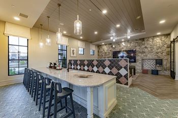 Game room with billiards and entertainment kitchen