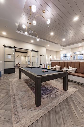 Game room with billiards and entertainment kitchen