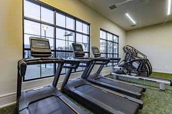 Cardio and strength training fitness center with echelon mirror
