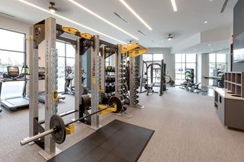 Cardio and strength training fitness center with free peloton spin class subscription