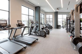 Cardio and strength training fitness center with free peloton spin class subscription