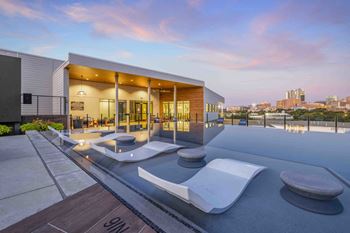 North building: rooftop infinity edge pool with outdoor lounge, cabanas and jumbotron