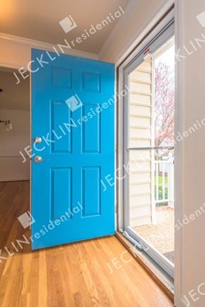 Henrico house for rent - A blue door is open to a balcony.
