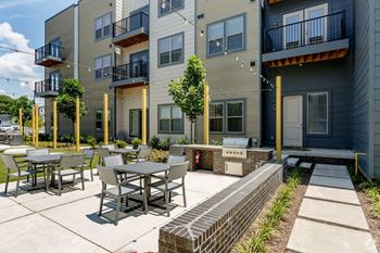 Courtyard with grills and picnic area
