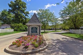 Cincinnati apartment for rent - the welcome sign at the end of a street in a neighborhood with trees at Brookstone Village, Cincinnati