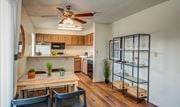 Tempe apartment for rent - an open kitchen and dining room with a table and chairs at Murietta at ASU, Arizona