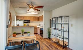 Tempe apartment for rent - an open kitchen and dining room with a table and chairs at Murietta at ASU, Arizona