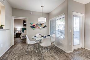 Phoenix apartment for rent - A dining room with a white table and chairs at Sweetwater At Metro North Apartments, Phoenix, AZ