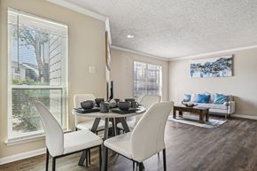 Dallas apartment for rent - a dining room with a table and chairs and a window at The Glen at Highpoint, Dallas, 75243