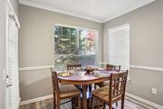 Greensboro apartment for rent - A dining room with a table set for four. at Bridford Lake Apartments, Greensboro
