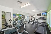 Bradenton apartment for rent - A gym with treadmills, exercise bikes, and other equipment. at Sarasota South Apartments, Bradenton, 34207