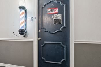 Closed door with a sign on it that says closed