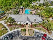 Orlando apartment for rent - A large house with a pool in the backyard at The Parkway at Hunters Creek, Orlando, 32837